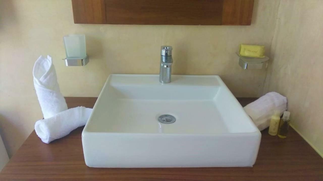 Taan' Hotel ตูลุม ภายนอก รูปภาพ